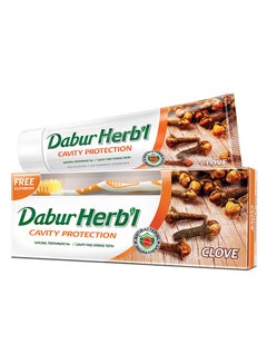 Buy Dabur Herbal Cavity Protectection Clove Toothpaste + Toothbrush| Enriched with Clove | Natural Toothpaste For Cavity Free Strong Teeth 150grams in UAE