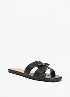 Buy Monogram Print Slip-On Sandals with Bow Applique in UAE