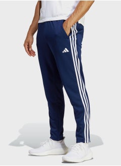 Buy 3 Stripes Train Essential Sweatpants in UAE