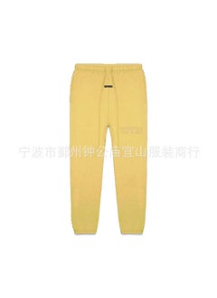 اشتري 2023 SS Silicone Print FOG Essentials Sweatpants Goose yellow LightTuscan في الامارات