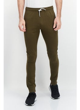 Buy Men Sportswear Fit Brand Logo Sweatpants, Olive in UAE