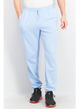 Buy Men Sportswear Fit Training Unitefit Sweatpants, Sky Blue in UAE