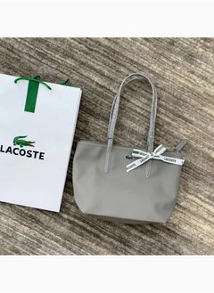 Buy Lacoste Women's Concept Fashion Versatile Small Zipper Handbag Shoulder Bag grey in Saudi Arabia