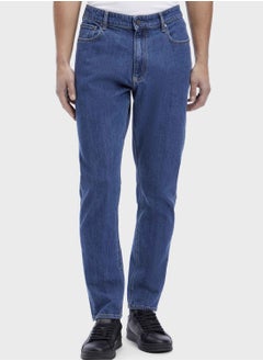 اشتري Mid Wash Tapered Fit Jeans في الامارات