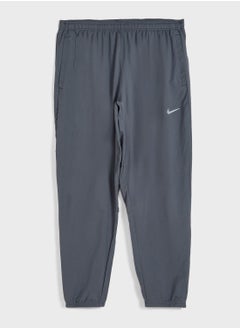 Buy Dri-Fit Challenger Woven Sweatpants in UAE