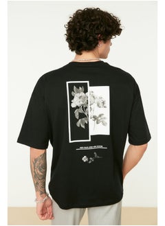 اشتري Men's Black Oversize/Wide-Fit Crew Neck Floral Printed Short Sleeve  T-Shirt في مصر