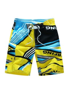 Buy Printed Beach Shorts Yellow/Black in UAE