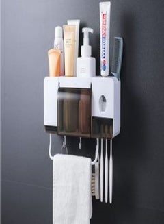 اشتري Automatic toothpaste dispenser squeezer wall-mounted and dust-proof toothbrush holder, multifunctional space-saving toothbrush storage rack في السعودية