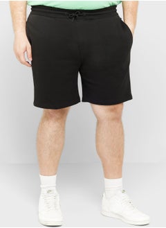 Buy Logo Tape Plus Size Sweatshorts in UAE