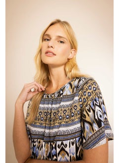 Buy Woman Loose Fit Crew Neck Woven Short Sleeve Blouse in Egypt
