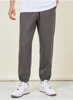 Buy Solid French Terry Relaxed Fit Joggers in Saudi Arabia