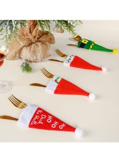 اشتري Set Of 4 Christmas Santa Hat Silverware Holder For Dinner Table. في الامارات