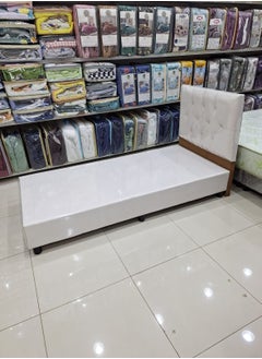 Buy Luxurious wooden box bed covered in leather with plastic bases size 90*190 cm in Saudi Arabia