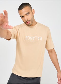 Buy Cotton Rich Oversized Balance Upside Down Text Print T-Shirt in Saudi Arabia