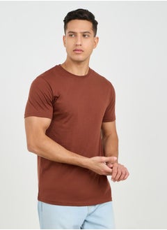 Buy Cotton Solid Regular Fit T-Shirt in Saudi Arabia