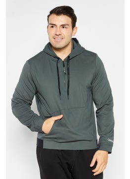 Buy Men Sportswear Fit Hooded Textured Long Sleeve Sweatshirt, Green in UAE