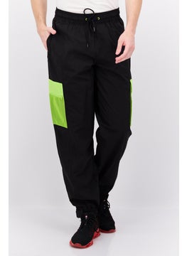 Buy Men Sportswear Fit Brand Logo Training Track Pants, Black/Lime Green in UAE