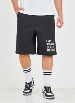 Buy Oversized Slogan Print Hem Terry Athleisure Shorts in Saudi Arabia