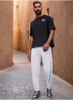 اشتري Oversized Side Vertical Print and Popper Detail Joggers في السعودية