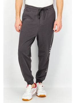 Buy Men Special Fit Embroidered Jogger Pants, Grey in UAE