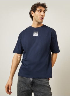 Buy Oversized Minimal Chest Graphic Pure Cotton T-Shirt in Saudi Arabia