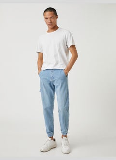 Buy Jogger Jean Trousers Buttoned Pocket Detailed Cotton in UAE