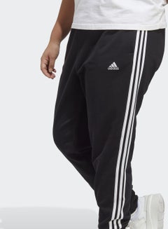 Buy Essentials 3-Stripes French Terry Cuffed Joggers (Plus Size) in Saudi Arabia