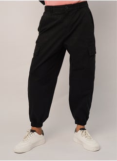 Buy Men’s Button Secured Multi Pockets Jogger Pant in Pure Black in UAE