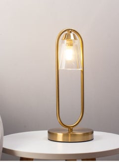 Buy Luxurious golden oval table lamp, height 31 cm, lampshade suitable for the bedroom, bedside, living room, above small tables in Saudi Arabia