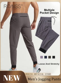 Buy Men Sports Pants for Running Fitness Cycling Quick Dry Woven Workout Pants with Multiple Pockets Elastic Waistband and Tapered Cuffs Comfortable and Loose Fit Casual Long Trousers in Saudi Arabia