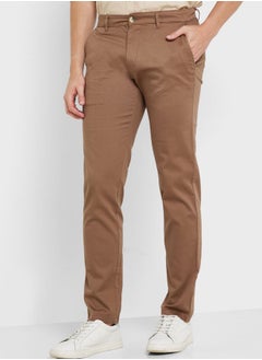 Buy Men Brown Easy Wash Sustainable Trousers in Saudi Arabia