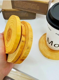 Buy A wooden coaster in the shape of a tree trunk for hot cups and also for dishes. It can be used as decoration on your desk or in your home. A set of 4 pieces inside a box.4 in Egypt