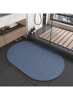 Buy Diatomite quick-drying household absorbent pad bathroom floor mat - oval blue in UAE