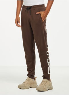 Buy Kappa Logo Print Joggers with Elasticated Waistband and Pockets in Saudi Arabia