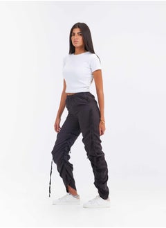 Buy High-Waist Black Cutout Ruched Parachute Trousers. in Saudi Arabia