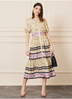 اشتري Floral Print Tie Up Neck Tiered Shirt Midi Dress في السعودية