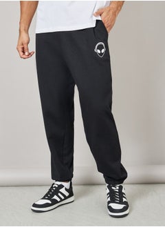 اشتري Oversized Placement Print Fleece Joggers with Elasticated Hem في السعودية