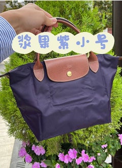 Buy Longchamp Canvas Dumpling Buns Travel Bag in Saudi Arabia