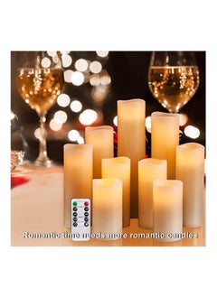 اشتري 9 sets Flameless Flickering Battery Operated Candles Ivory Real Wax Pillar LED Candles with 10 Key Remote and Cycling 24 Hours Timer في الامارات