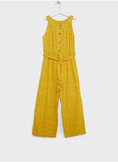 Buy Natilene Girls Yellow Solid Jumpsuit With Waist Tie-Ups in Saudi Arabia