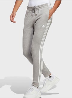 Buy 3 Stripes Essential French Terry Cuffed Sweatpants in UAE