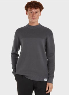 اشتري Essential Woven Sweater في الامارات