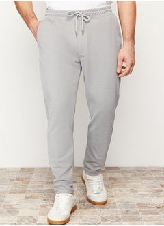 اشتري Gray Jogger Fit Lace Waist Textured Knitted Comfortable Trousers TMNSS24PL00007 في مصر