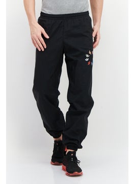 Buy Men Sportswear Fit Training Track Pants, Black in UAE