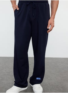 Buy Navy Blue Oversize/Relaxed Fit Elastic Waist Sweatpants with Label TMNSS24EA00006 in Egypt