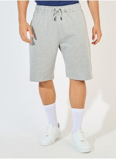 Buy Oversized Solid Shorts with Drawstring in Saudi Arabia