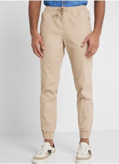 Buy Thomas Scott Men Beige Joggers Trousers in UAE