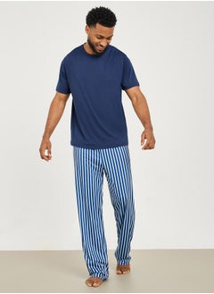 Buy Solid Short Sleeve T-Shirt & Striped Pyjama Set in Saudi Arabia