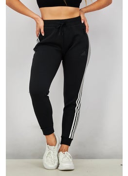 Buy Women Sportswear Fit Future Icon Outdoor Pants, Black in UAE