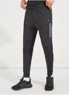 Buy Solid Knit Contrast Panel Tapered Trackpants in Saudi Arabia